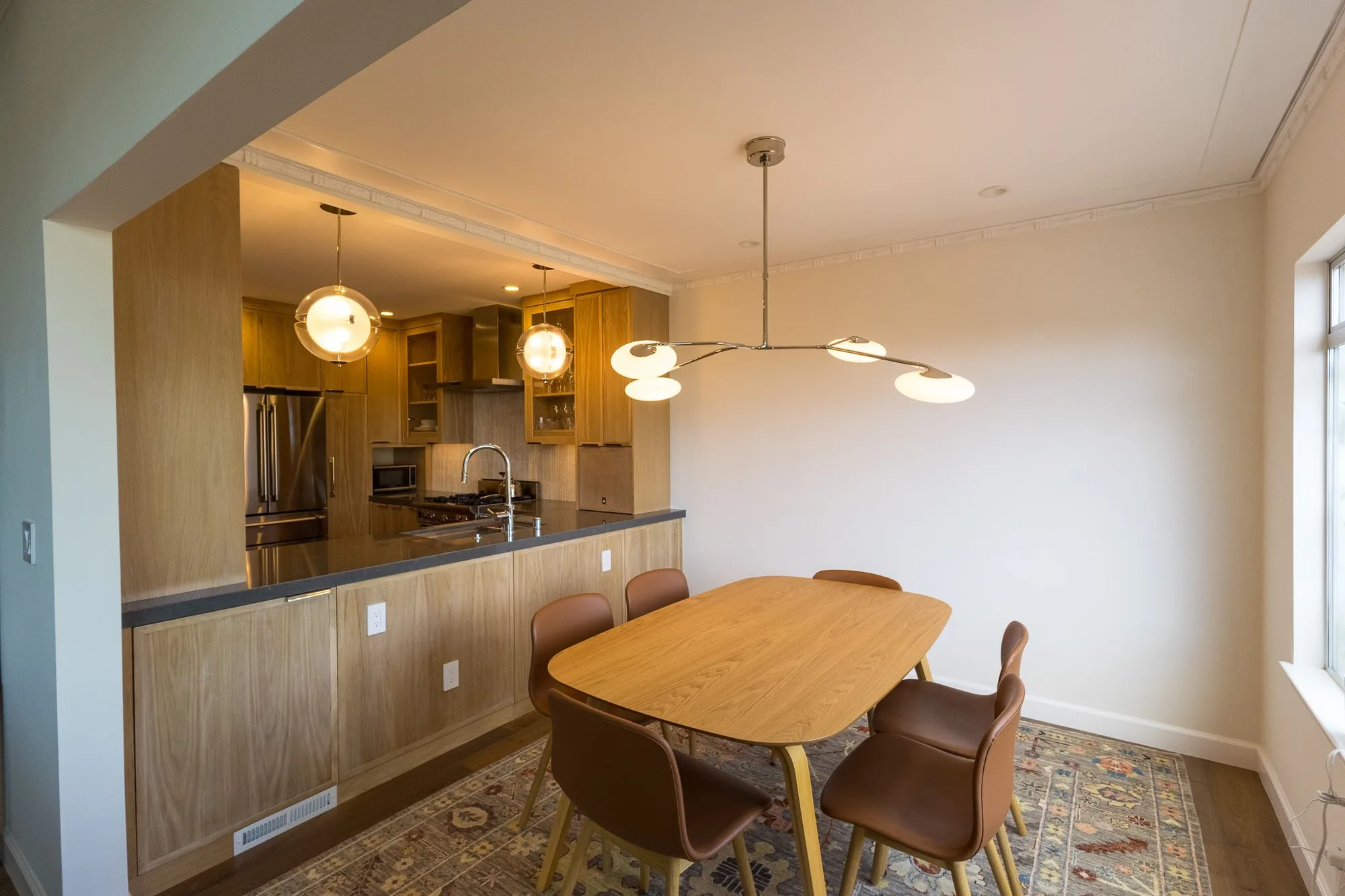 Dining room with sculptural pendant
